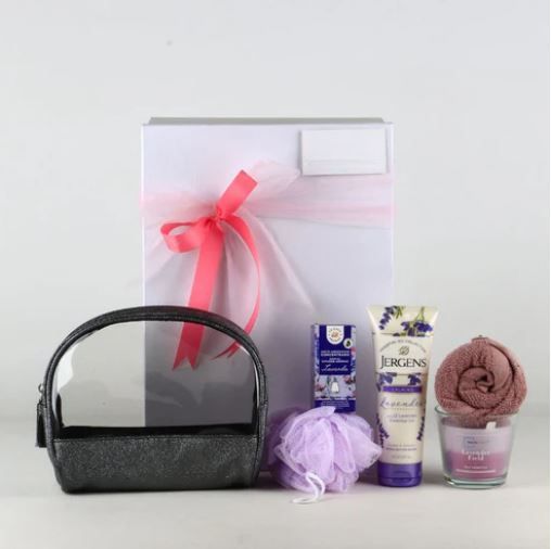 Caja de lujo "Amethyst Glow" con lavanda y productos para el bienestar.
