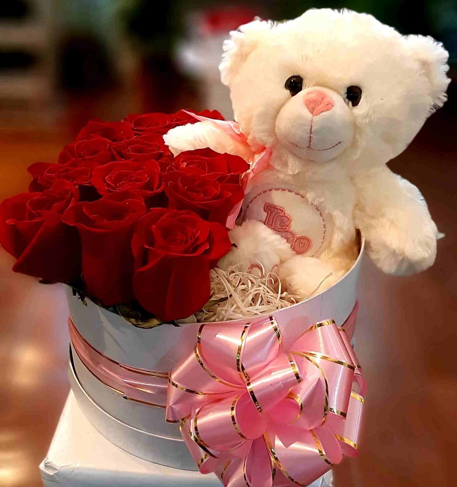 Caja 12 rosas y peluche