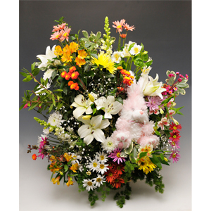 Arreglo floral con lirios, rosas y San Vicentes Premium