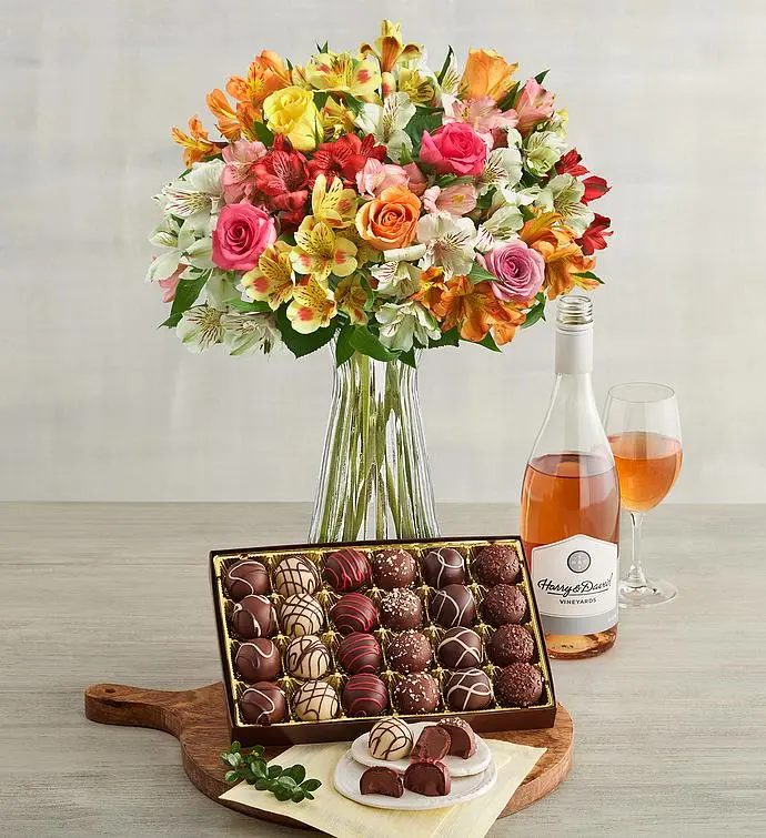 Rosas y lirios peruanos surtidos, trufas de chocolate y vino (Rosas y lirios peruanos surtidos, trufas de chocolate y rosa)