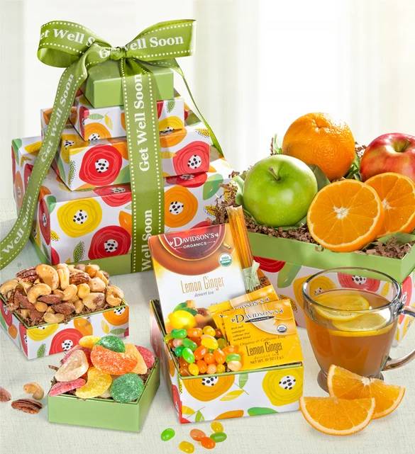 Torre de frutas y dulces para desear una pronta recuperación
