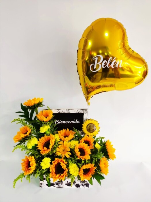 Arreglo floral con girasoles, gerberas, claveles.