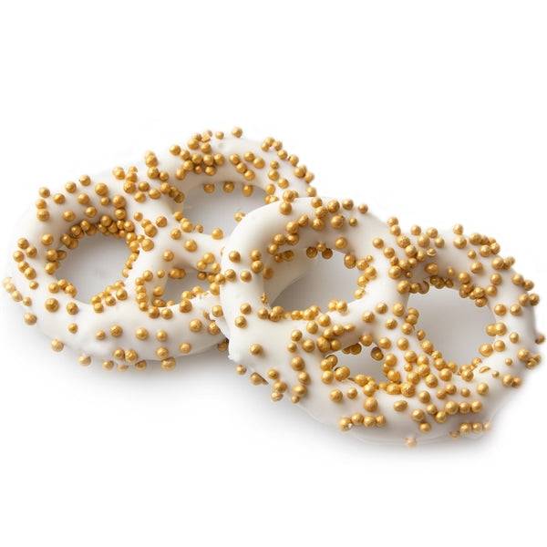 Pretzels cubiertos de chocolate con perlas doradas - 96 unidades