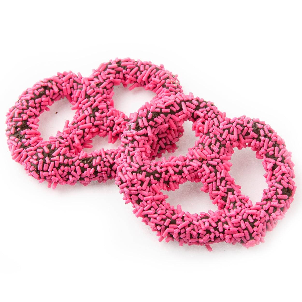 Pretzels cubiertos de chocolate con chispas rosas - 96 unidades