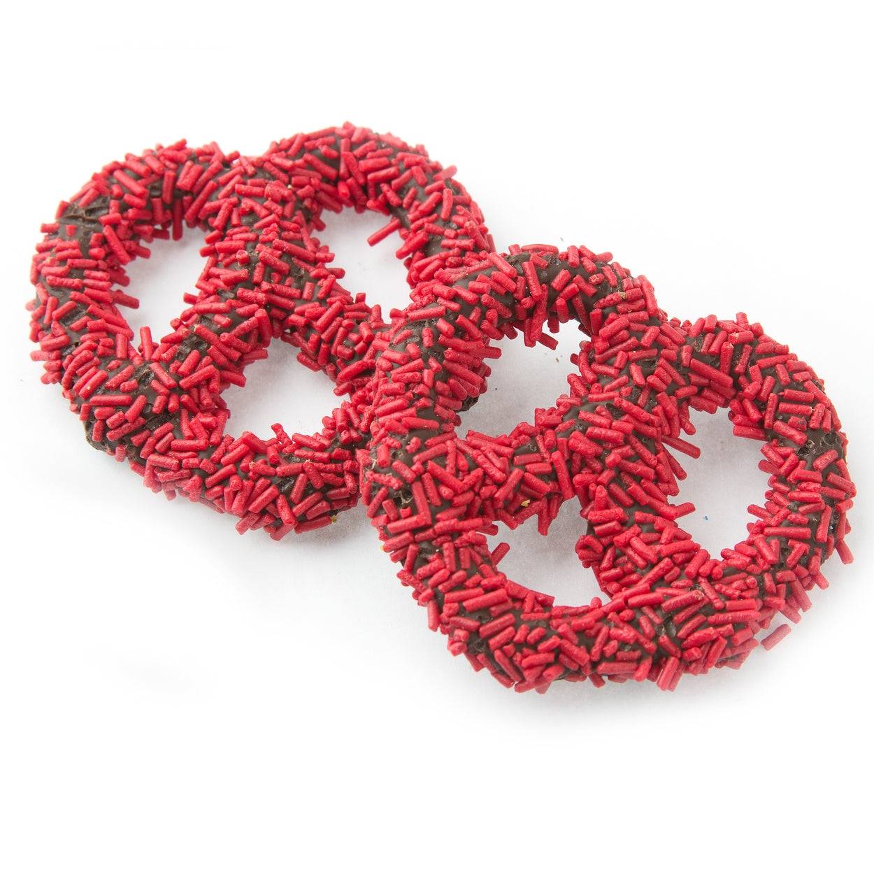 Pretzels cubiertos de chocolate con chispas rojas - 96 unidades