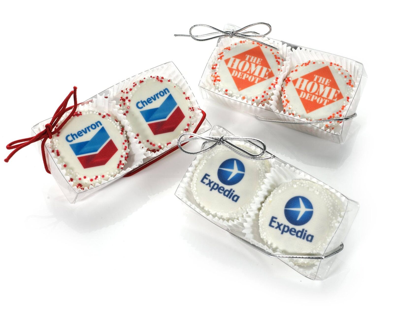 Galleta sándwich decorada y bañada a mano con logo - Caja transparente de 2 unidades